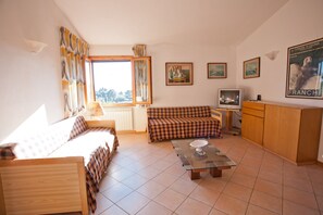 Apartment (Trilo) | Living area | TV - Appartamenti Norsi (Capoliveri)