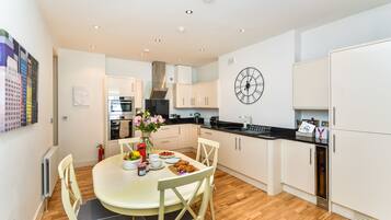 Luxury Apartment, 2 Bedrooms | Private kitchen | Full-size fridge, microwave, oven, stovetop