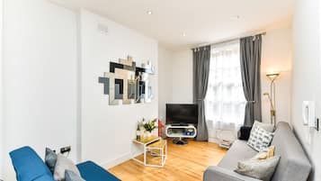 Luxury Apartment, 2 Bedrooms | Living area | Flat-screen TV