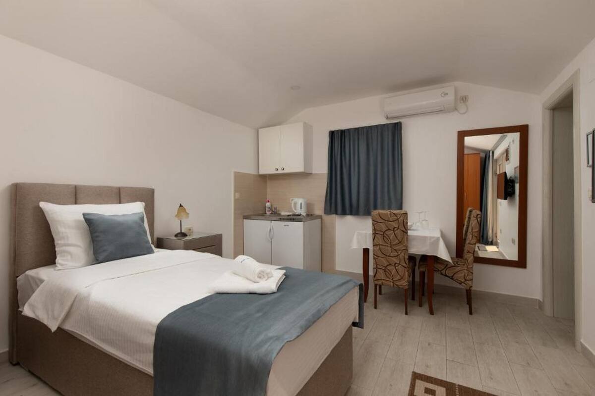 Suite estudio, terraza | 1 dormitorio, caja fuerte, escritorio y sistema de insonorización