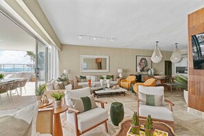 Panoramic Apartment | Living room | 55-inch Smart TV with digital channels, Netflix, streaming services - Costa Atlantica Beach Condos (Punta Cana)