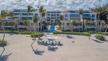 Enjoy a relaxing stay with a poolside view from your balcony overlooking the beach.