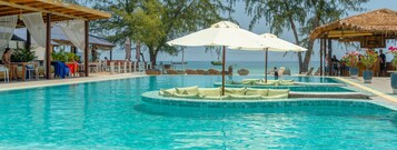 Outdoor pool, open 7:00 AM to 10:00 PM, free pool cabanas