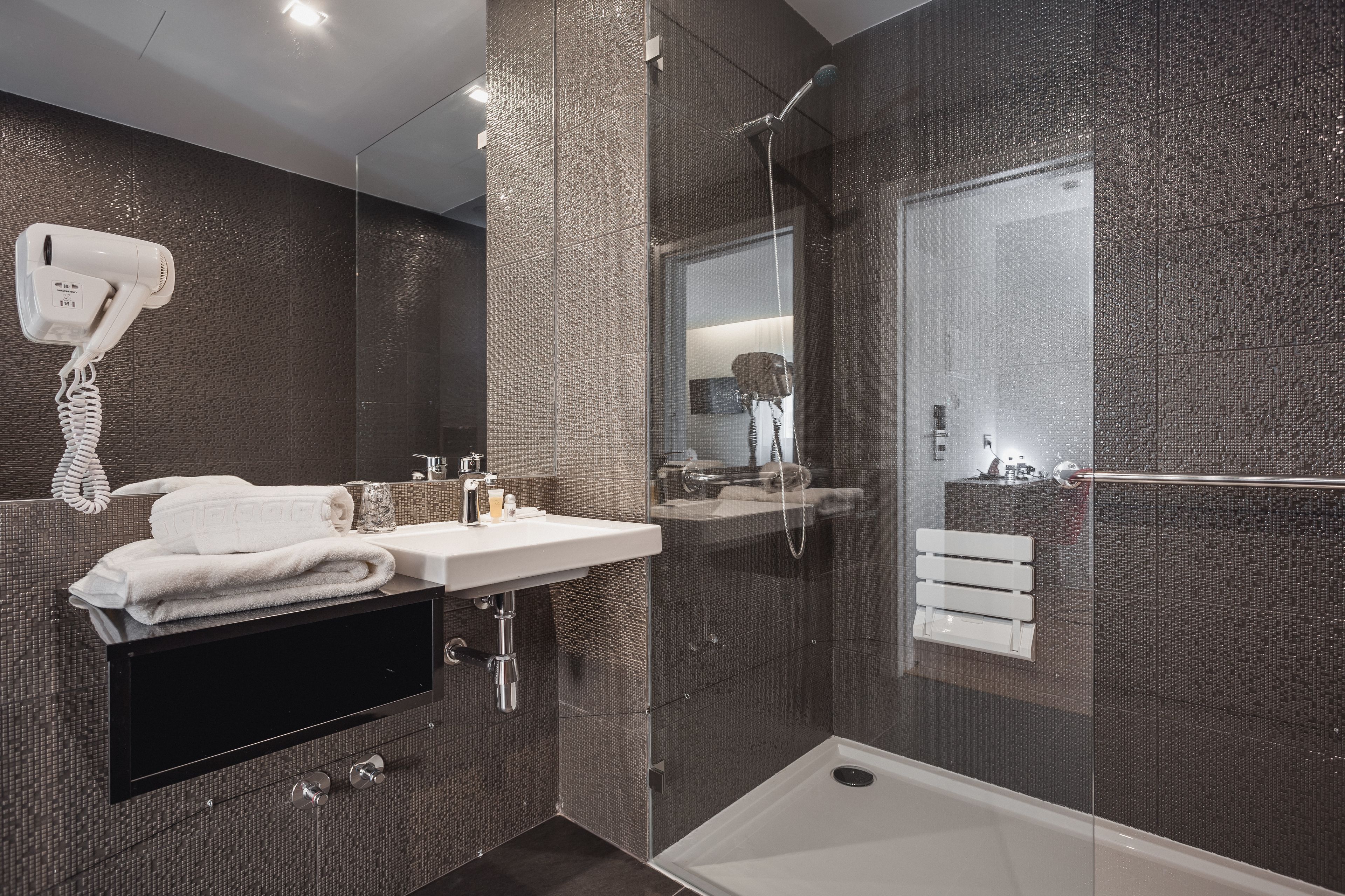 free toiletries, hair dryer, towels, soap