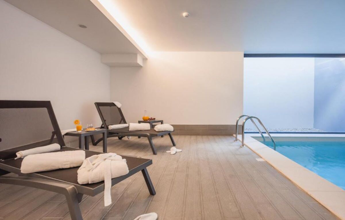 Indoor pool, open 10:00 AM to 10:00 PM, sun loungers