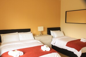 1 bedroom, premium bedding, blackout curtains, iron/ironing board