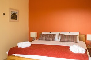 1 bedroom, premium bedding, blackout curtains, iron/ironing board