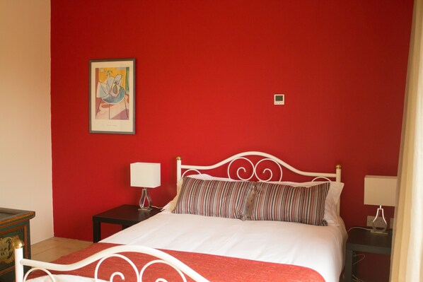 1 bedroom, premium bedding, blackout curtains, iron/ironing board