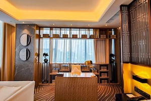 Suite, 1 King Bed, Smoking (Ramada Suite) | Minibar, in-room safe, laptop workspace, soundproofing