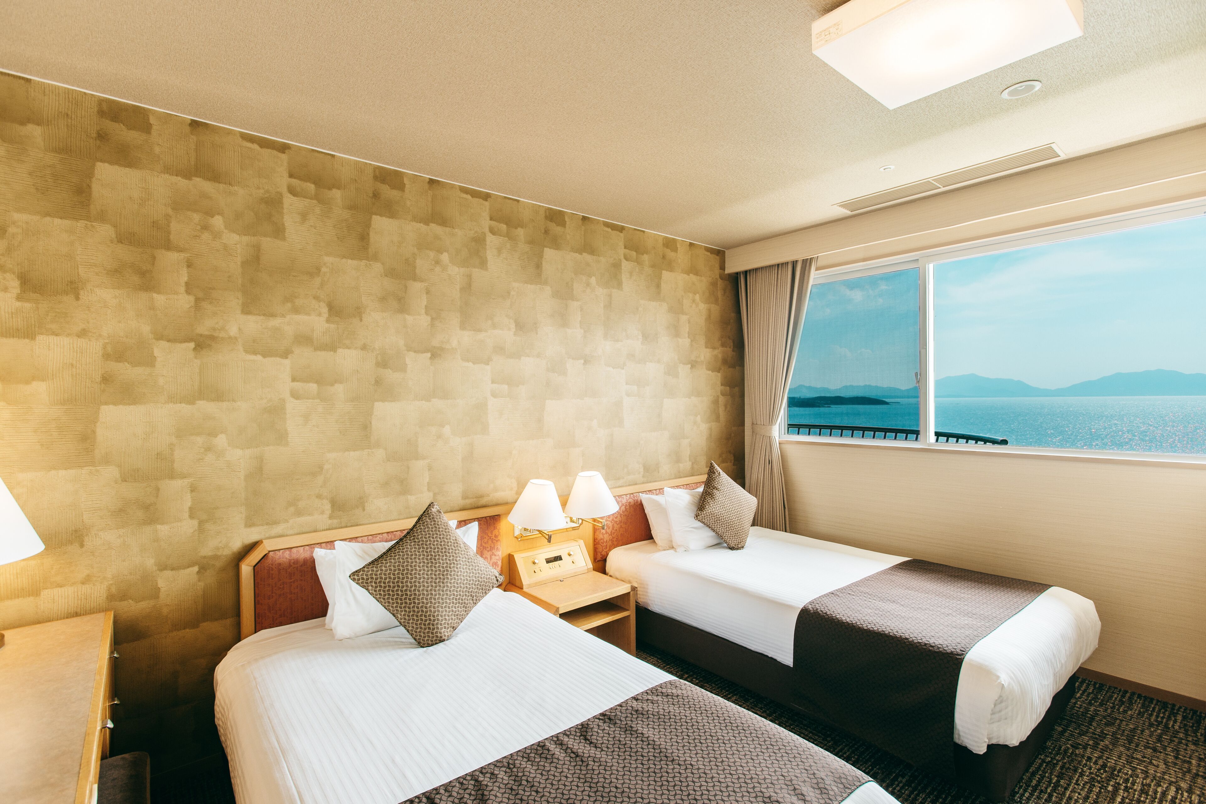 Habitación tradicional, para no fumadores (SP JP-Western style,Ocean view,W/bath) | Caja de seguridad en la habitación, wifi gratis y ropa de cama 
