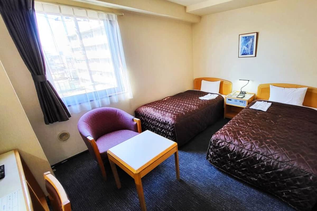 Couette en duvet, bureau, espace de travail pour ordinateurs portables