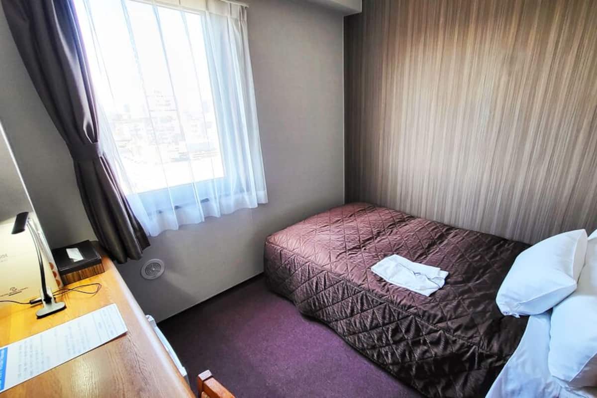 Couette en duvet, bureau, espace de travail pour ordinateurs portables