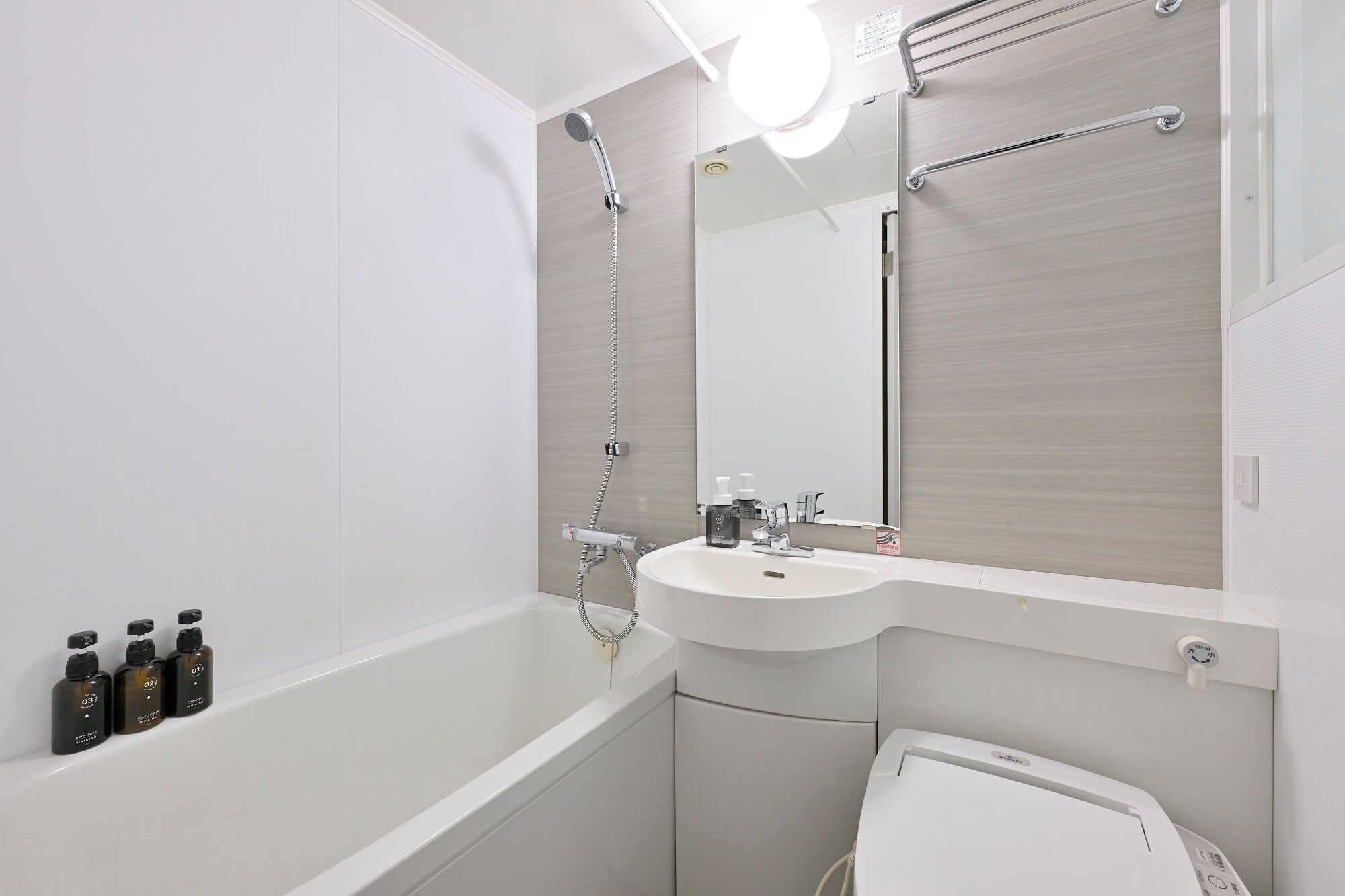 eco-friendly toiletries, hair dryer, slippers, bidet