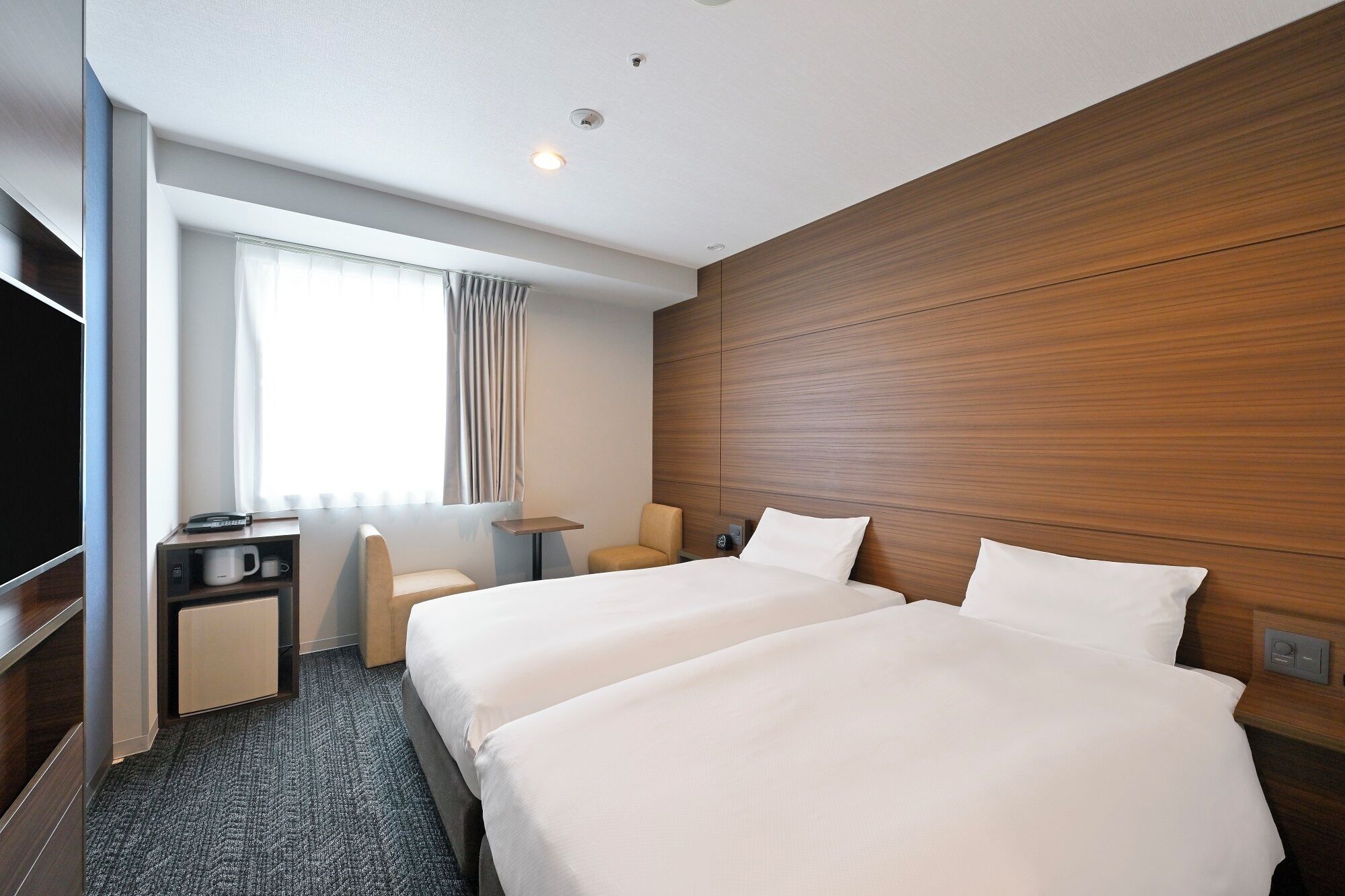 Down comforters, blackout drapes, iron/ironing board, free WiFi