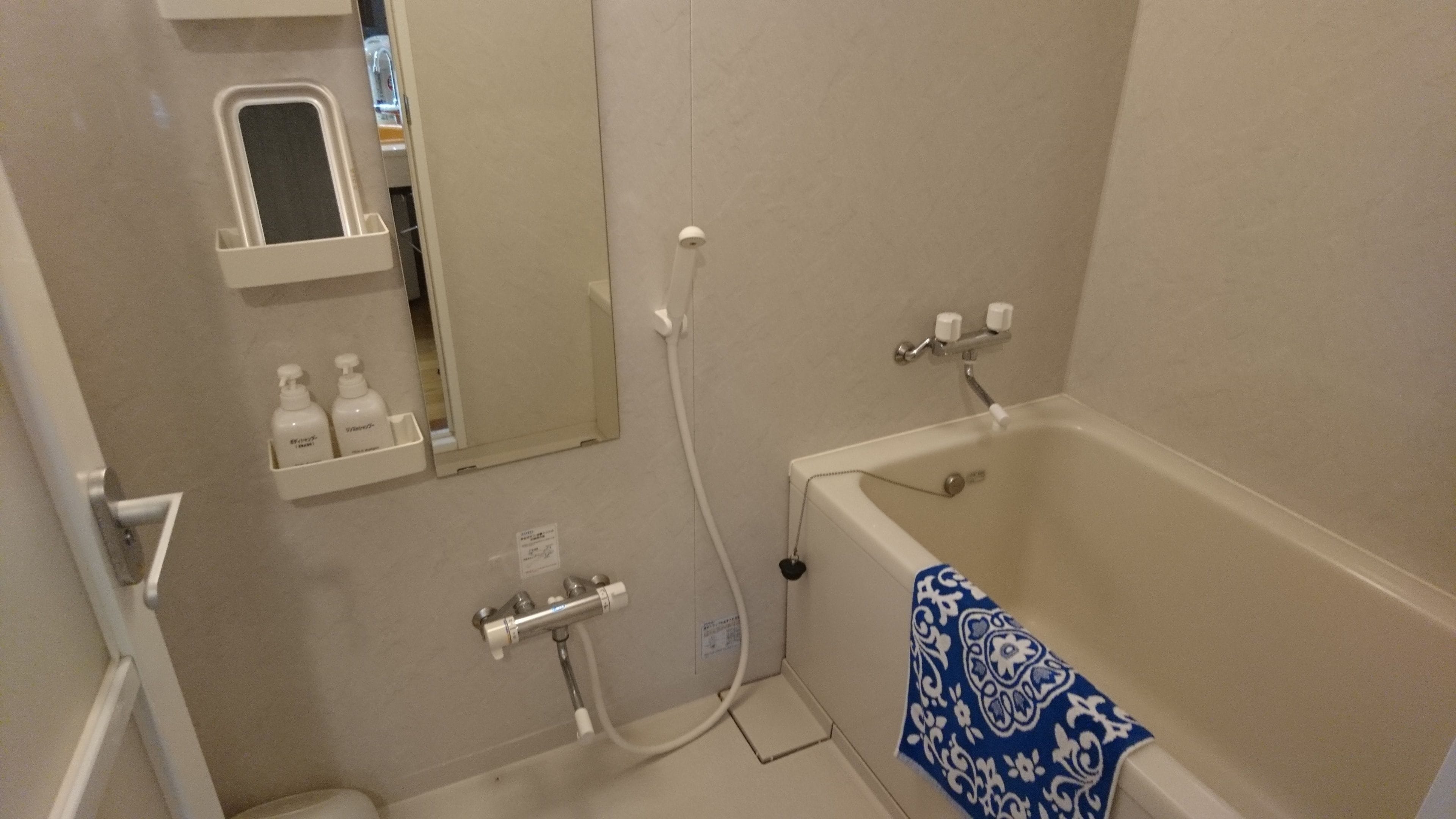 free toiletries, slippers, towels, toilet paper