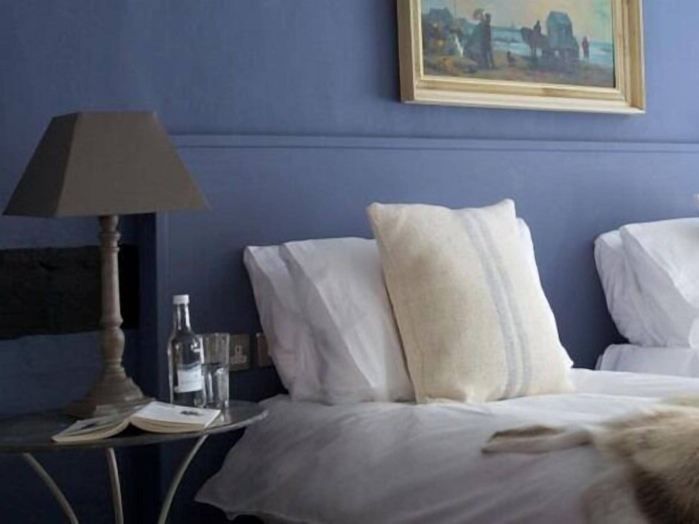 Fer et planche à repasser, draps fournis