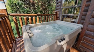 Cabin, 1 Bedroom | Outdoor spa tub