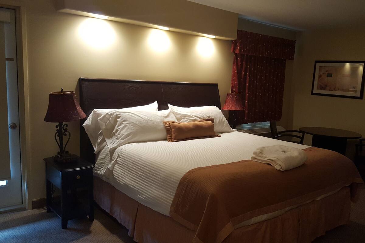 In-room safe, desk, laptop workspace, blackout curtains