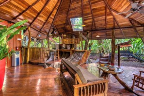 Exclusive Tree House, 2 Bedrooms, Hot Tub, Garden View | Living area | MP3 dock - Tree House Beachfront Lodge (Cahuita)