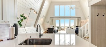 Roomy Chalet-Style Beachfront Condo with Private Beach Access by RedAwning