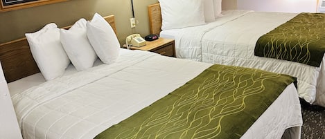 Standard-huone, 2 keskisuurta parisänkyä | Silitysrauta/-lauta, ilmainen Wi-Fi, vuodevaatteet