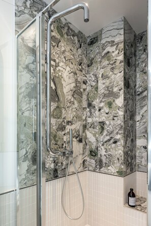 Bathtub, hair dryer, towels, soap
