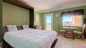 Tabla de planchar con plancha, wifi y ropa de cama