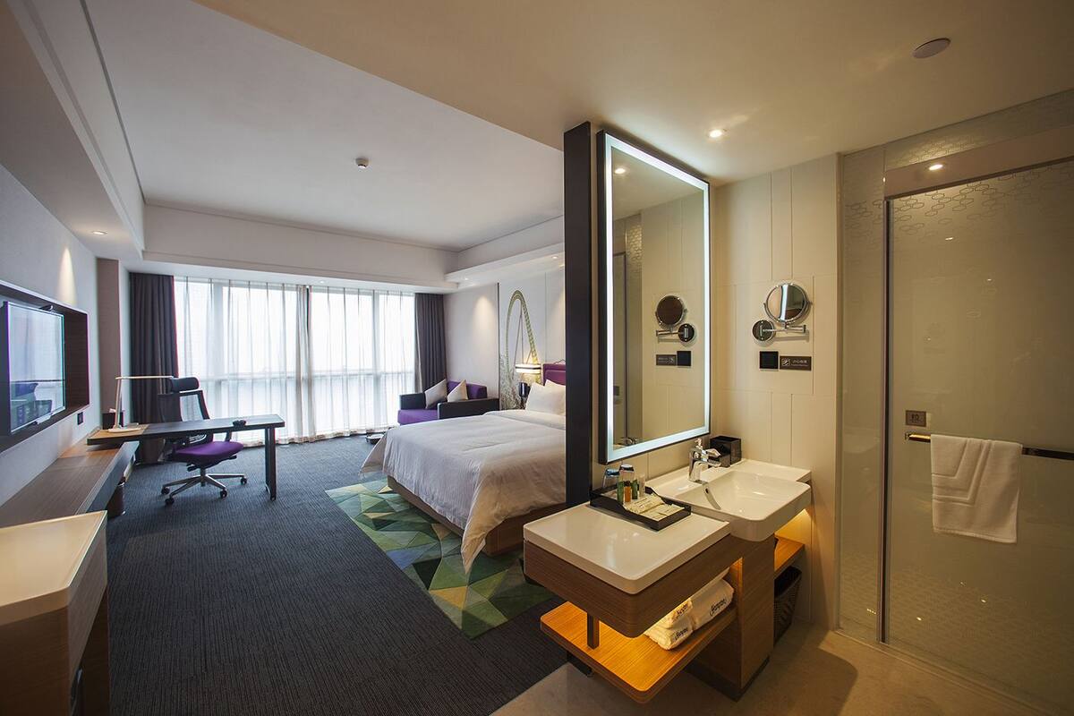 Habitación Deluxe doble | Minibar, escritorio, cortinas opacas y wifi gratis