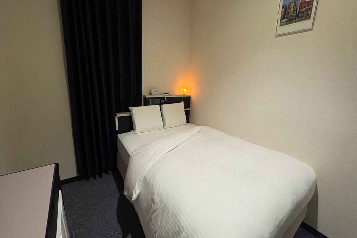 Desk, WiFi (free), bed sheets