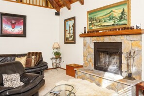 Smart TV, fireplace, books