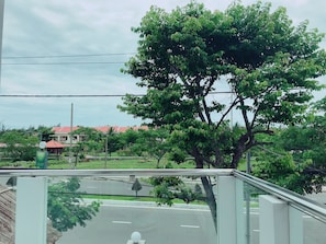 Deluxe King Room, Balcony | Street view