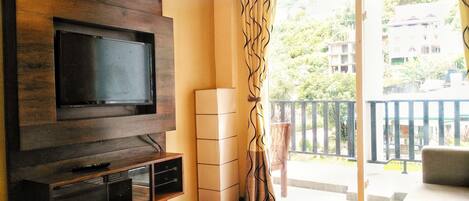 Luxury Apartment, 3 Bedrooms, Mountain View, Garden Area | Living area | Flat-screen TV