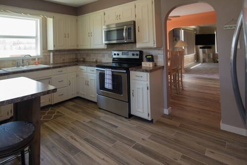 Manistee Channel Waterfront Home with Boat Dock