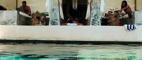 Outdoor pool, free cabanas, pool umbrellas