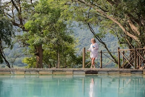 Indoor pool, outdoor pool, pool umbrellas, pool loungers