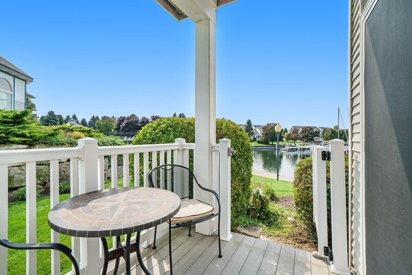 Outdoor dining - Cozy First Floor Condo on the Harbor (Manistee)