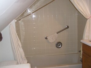 Combined shower/tub, hair dryer, towels, soap