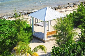 On the beach, sun loungers, beach towels