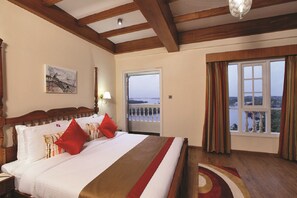 Ropa de cama de alta calidad, minibar, caja fuerte y escritorio