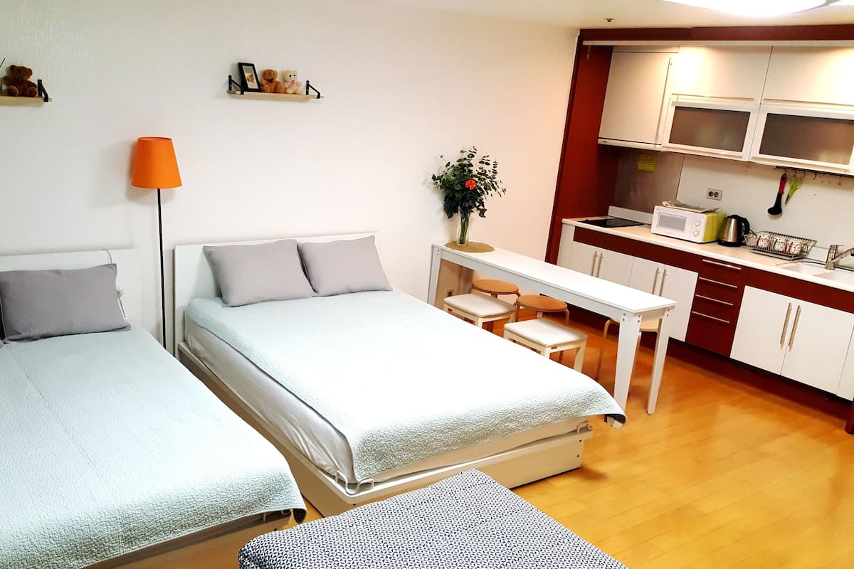 Family Room | 1 bedroom, desk, iron/ironing board, free WiFi