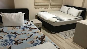 Chambre Familiale | Literie de qualité supérieure, Wi-Fi gratuit