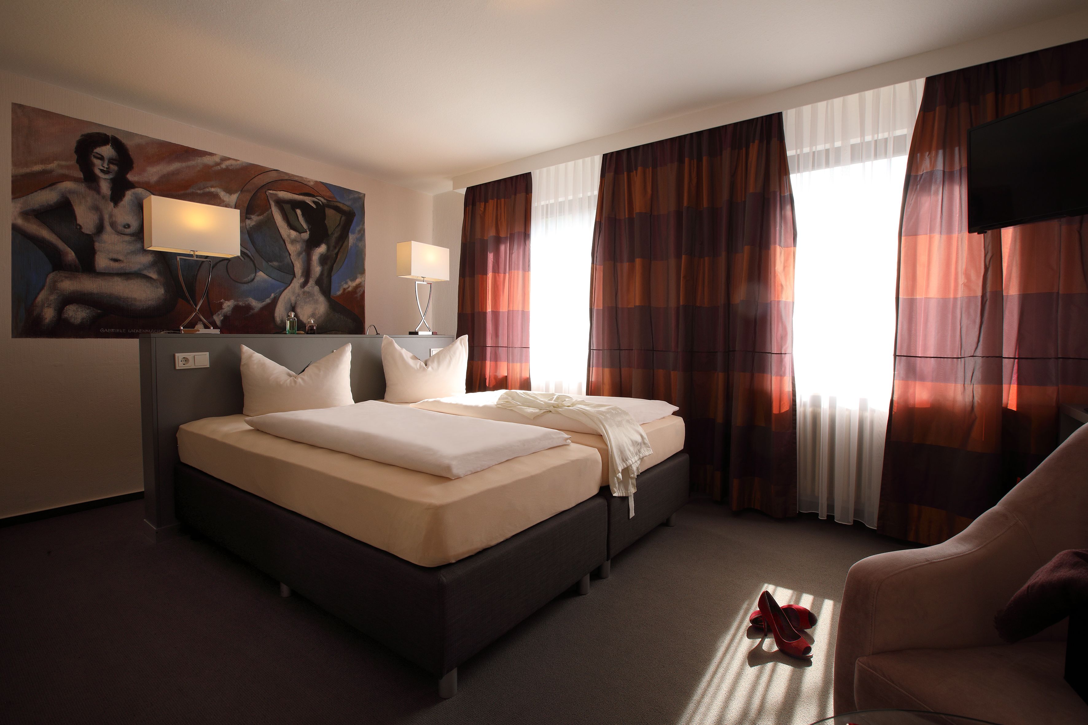 gallery double or twin room (near water) | premium bedding, in-room safe, individually decorated