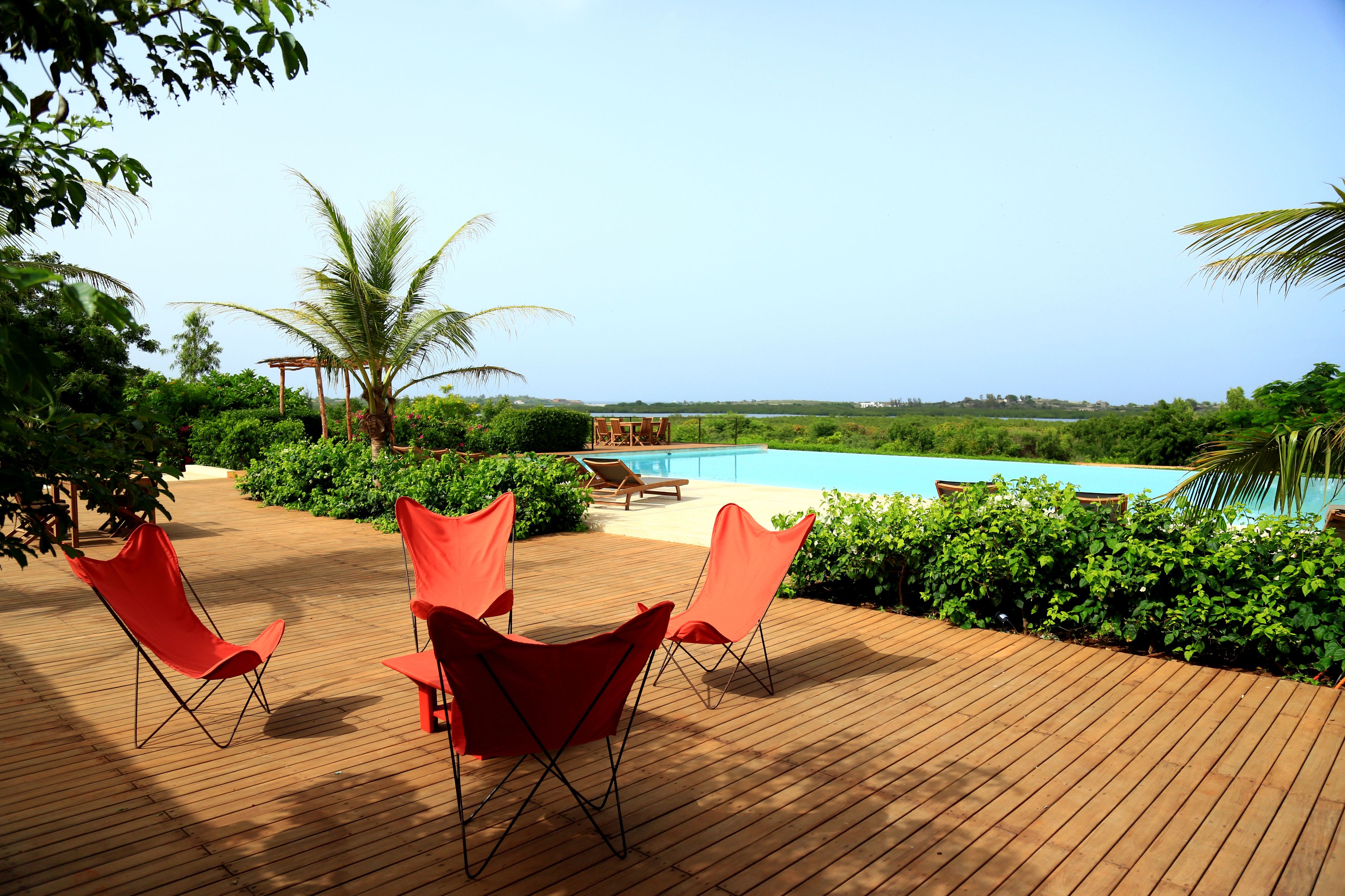 outdoor pool, pool umbrellas, pool loungers