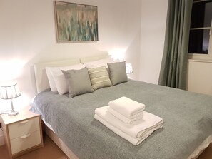 Apartment, 2 Bedrooms | Premium bedding, desk, iron/ironing board, cribs/infant beds