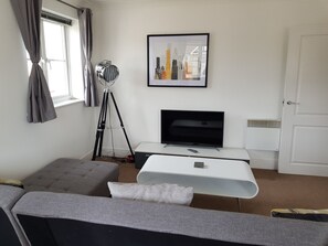 Apartment, 2 Bedrooms | Living room | Flat-screen TV - High View (Colchester)