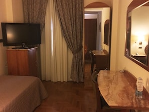 Down duvets, memory-foam beds, in-room safe, desk