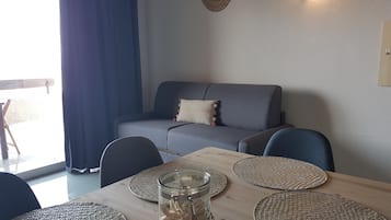 Apartment, 2 Bedrooms | Living area | Flat-screen TV