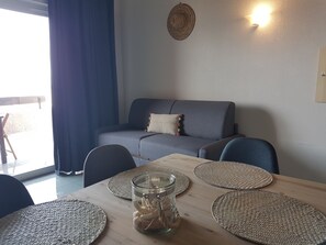 Apartment, 2 Bedrooms | Living area | Flat-screen TV - résidence Costa D'oru (Saint-Florent)