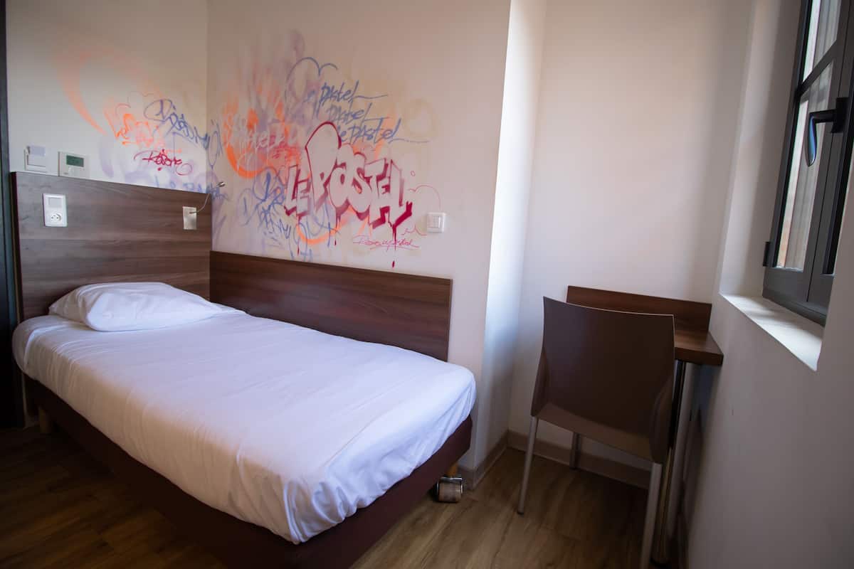 Standard Single Room | Premium bedding, desk, soundproofing, iron/ironing board