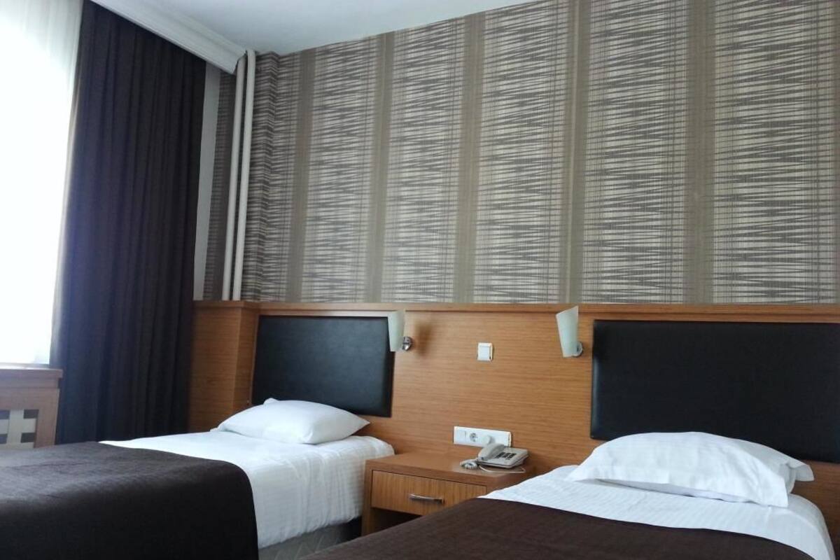 Quarto triplo | Ferros/tábuas de passar roupa, Wi-Fi de cortesia